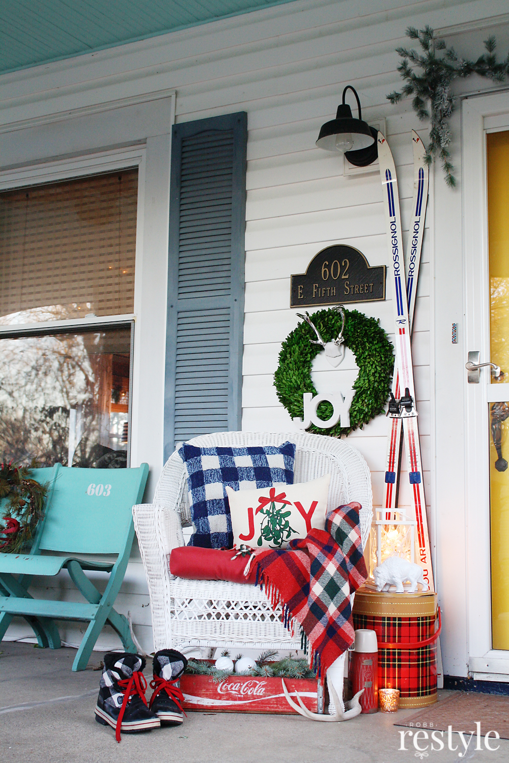 Eclectic Home Tour Christmas edition of Robb Restyle - love this porch filled with vintage finds including an old tartan thermos and a wooden soda crate