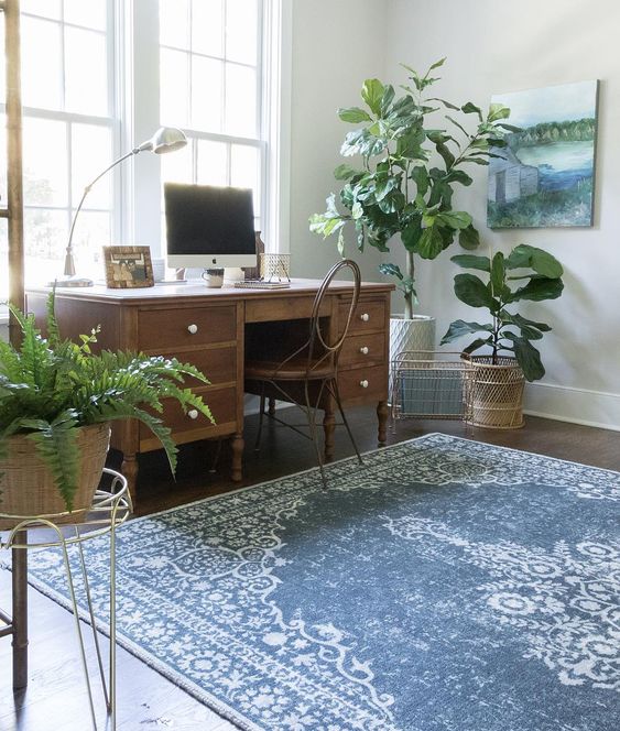 Eclectic Home Tour of Green Spruce Designs - love the blue over dyed rug and vintage desk