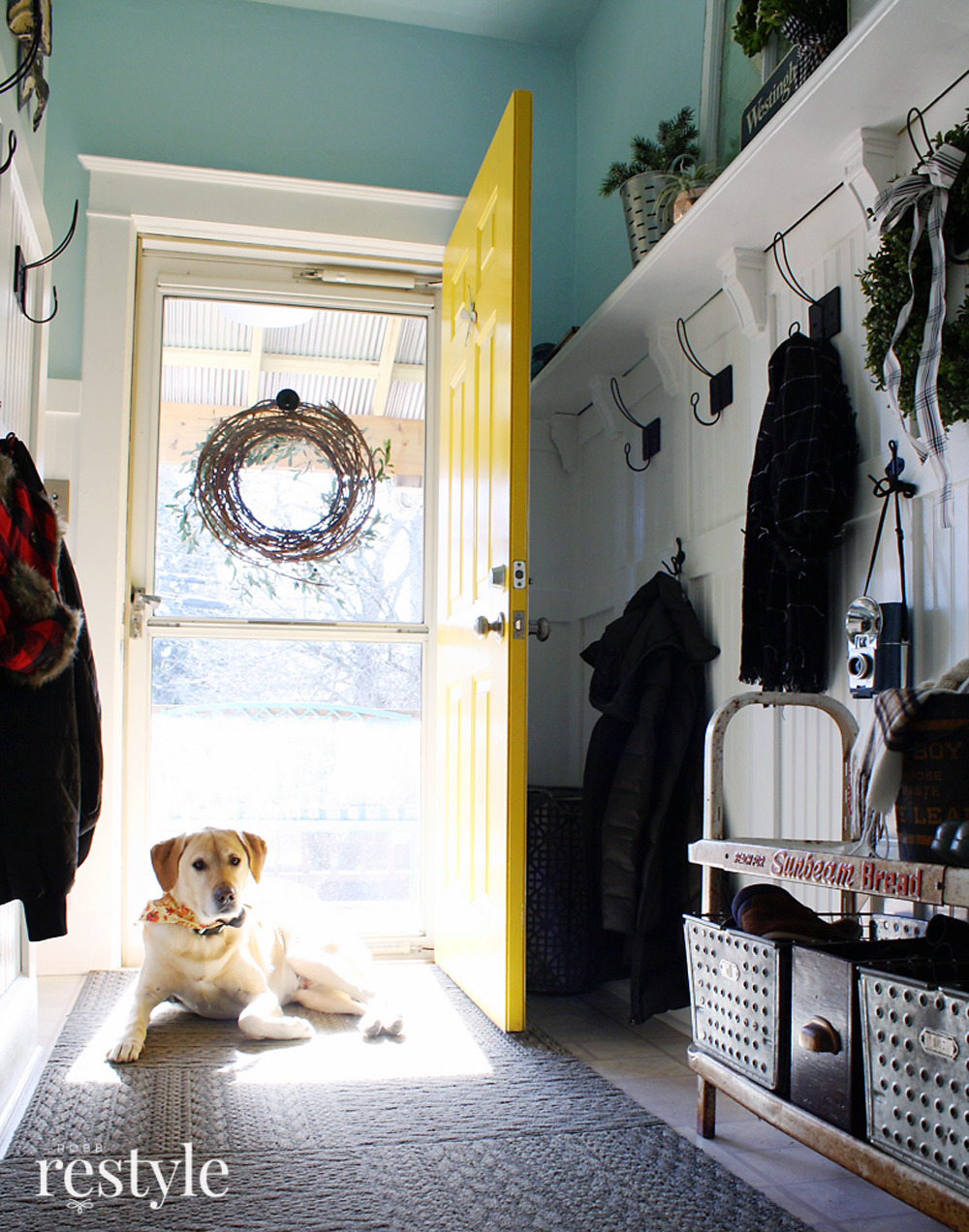 Eclectic Christmas Home Tour - love this foyer with yellow front door and vintage Sunbeam Bread shelf 