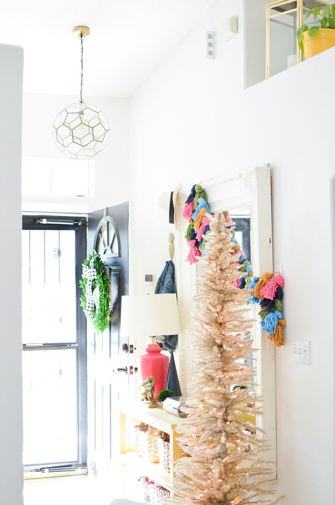 Christmas Eclectic Home Tour - love the slim white Christmas tree in the foyer 