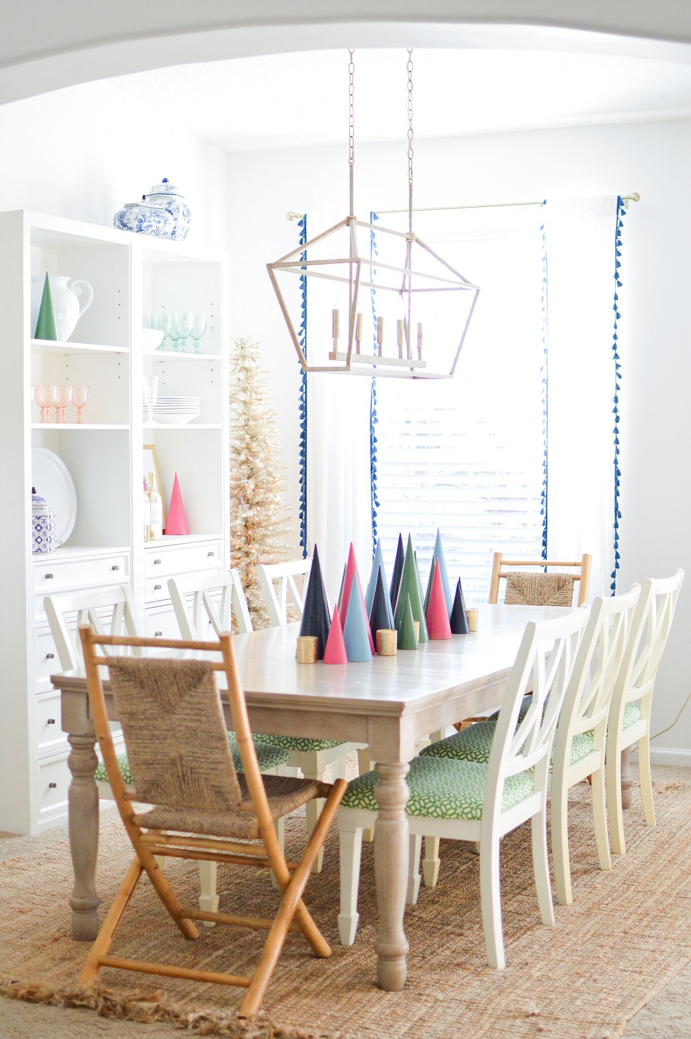 Christmas Eclectic Home Tour - love this dining room with colorful modern tree centerpiece 