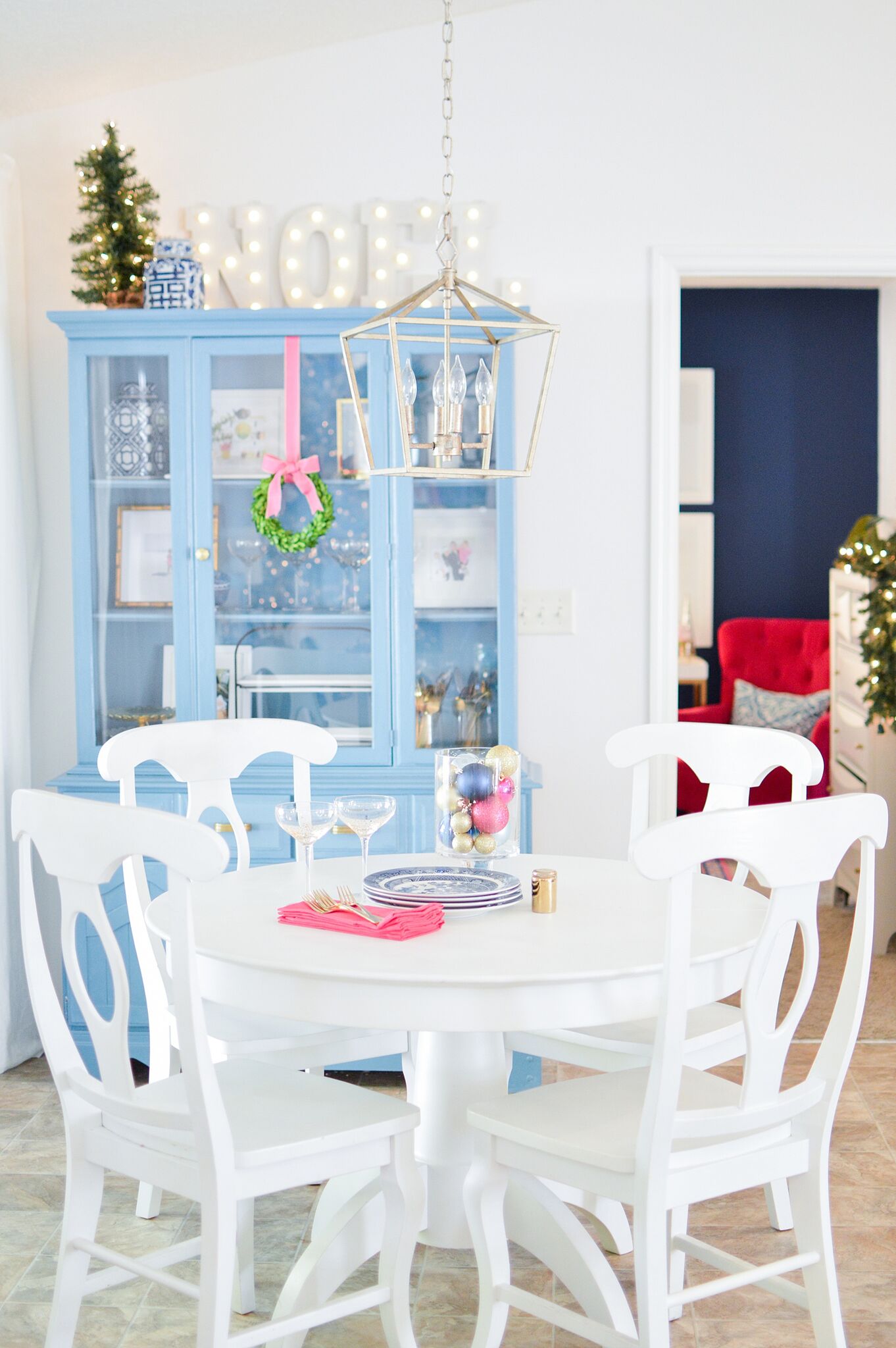 Christmas Eclectic Home Tour - love this blue hutch 