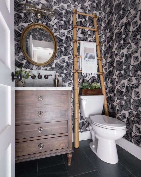 Eclectic Home Tour of Green Spruce Designs - love the graphic black and white wallpaper in this small powder room