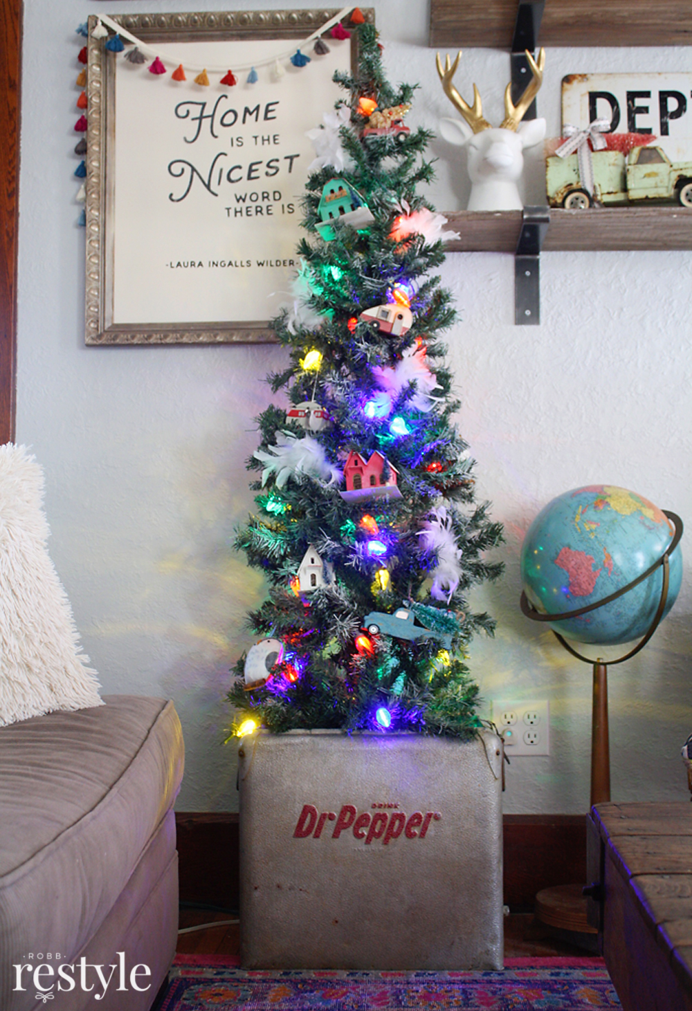 Eclectic Christmas Home Tour - love the vintage putz houses in the tree tucked into an old Dr Pepper cooler