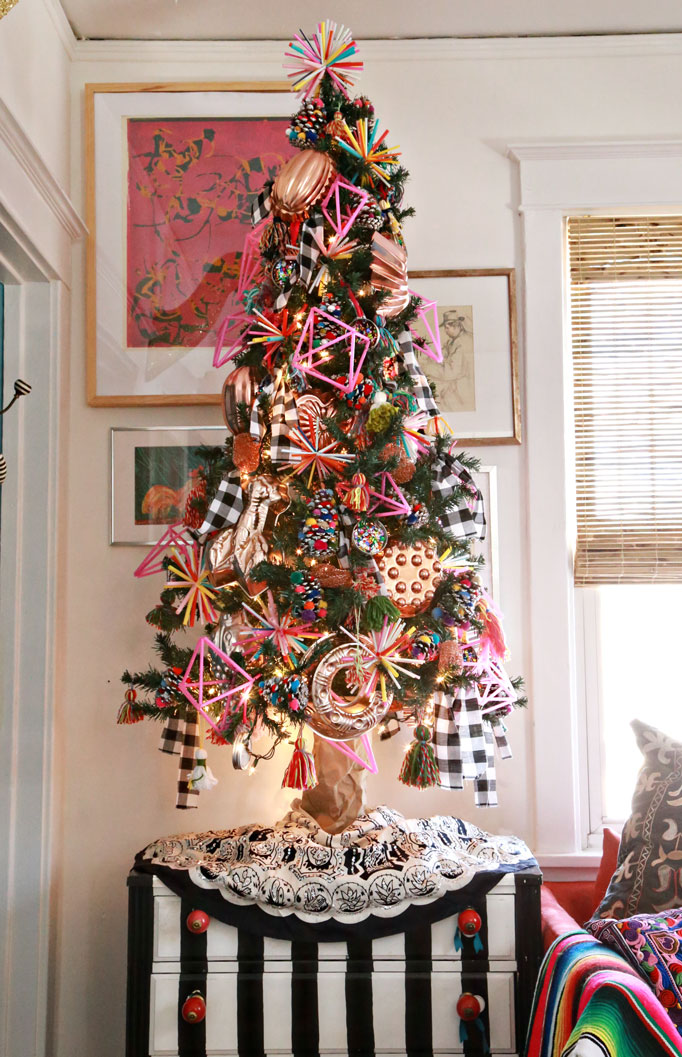 Christmas Home Tour - love this colorful tree with copper kitchen pan ornaments