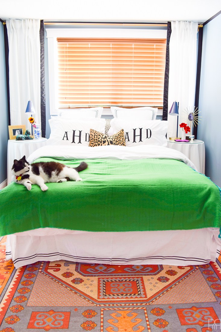 Eclectic Home Tour of PMQ for Two - get tons of renter friendly decorating and DIY ideas like how to disguise an off center window in the bedroom