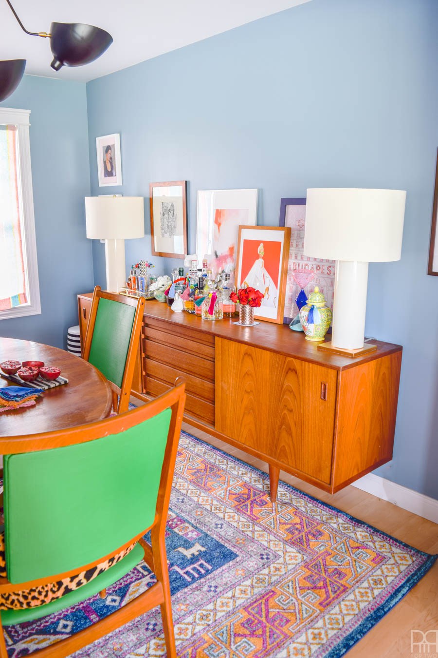 Eclectic Home Tour of PMQ for Two - get tons of renter friendly decorating and DIY ideas like this colorful, boho, mid century dining room