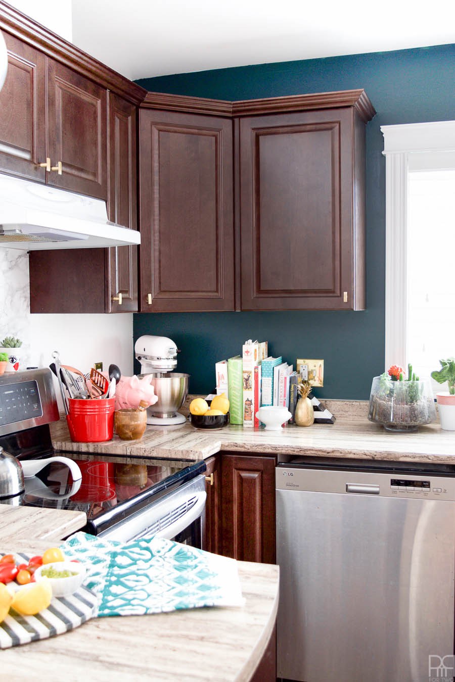 Eclectic Home Tour of PMQ for Two - get tons of renter friendly decorating and DIY ideas like how to add color and accessories to a plain kitchen