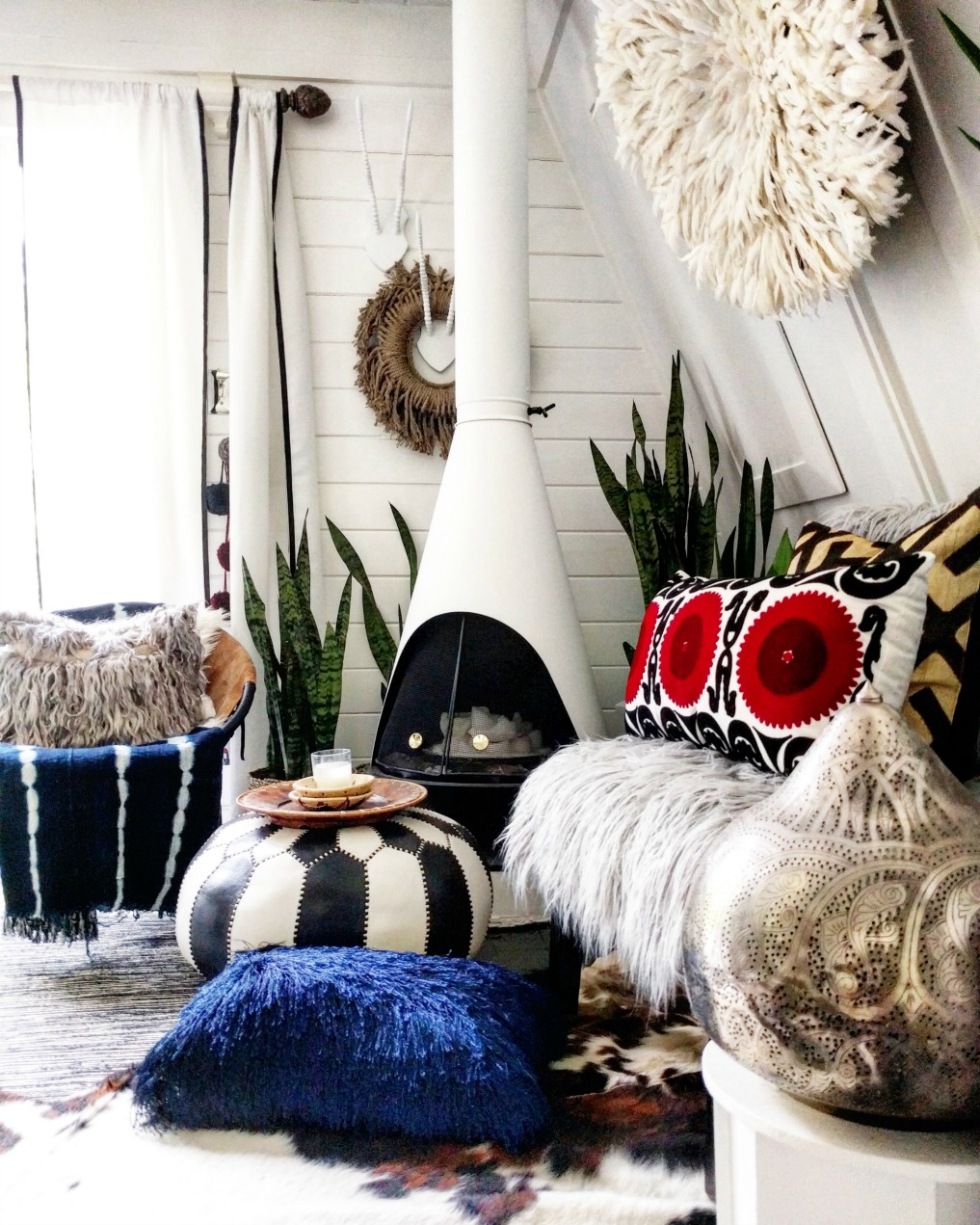 Eclectic Home Tour - Insieme House - tour this tiny house with boho flair - love the Moroccan pouf and the African Juju hat