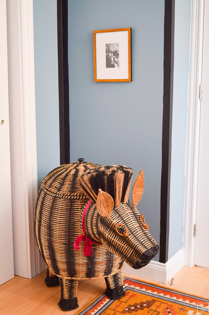 Eclectic Home Tour of PMQ for Two - get tons of renter friendly decorating and DIY ideas like adding unique accessories like this zebra hamper for a one of a kind look