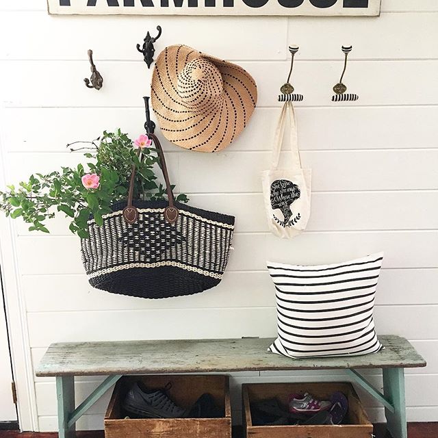 Eclectic Home Tour of Liv and Grace Restored - love the charming vintage touches like this mudroom with old bench and crate shoe storage kellyelko.com