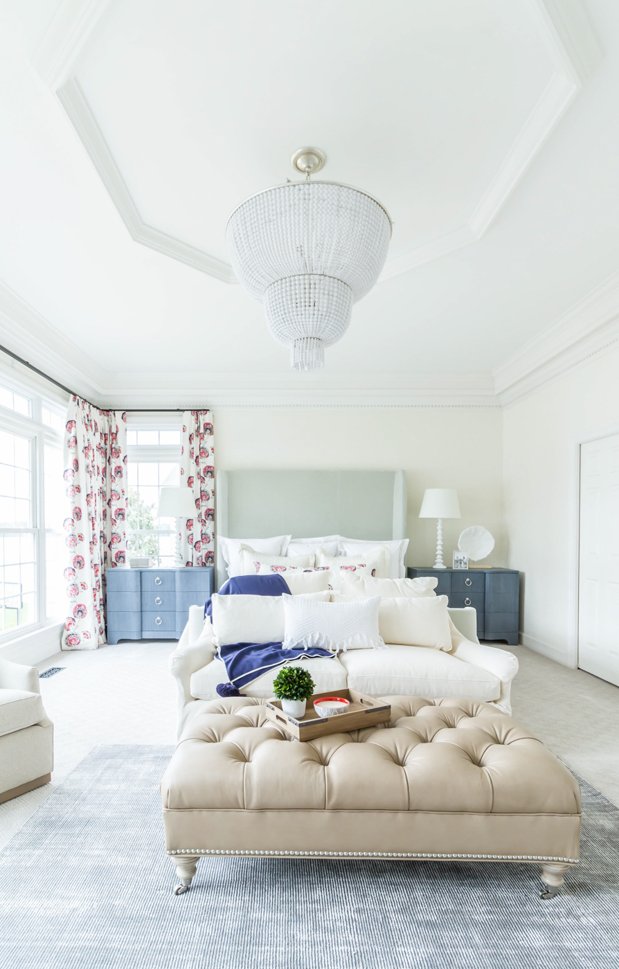 Eclectic Home Tour - love this huge master bedroom with blue nightstands and room for a seating area #masterbedroom #bedroom #bedroomdecor 