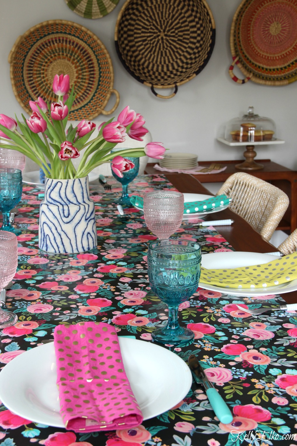 Beautiful spring table - love the floral table runner, blue and pink glasses and colorful napkins kellyelko.com