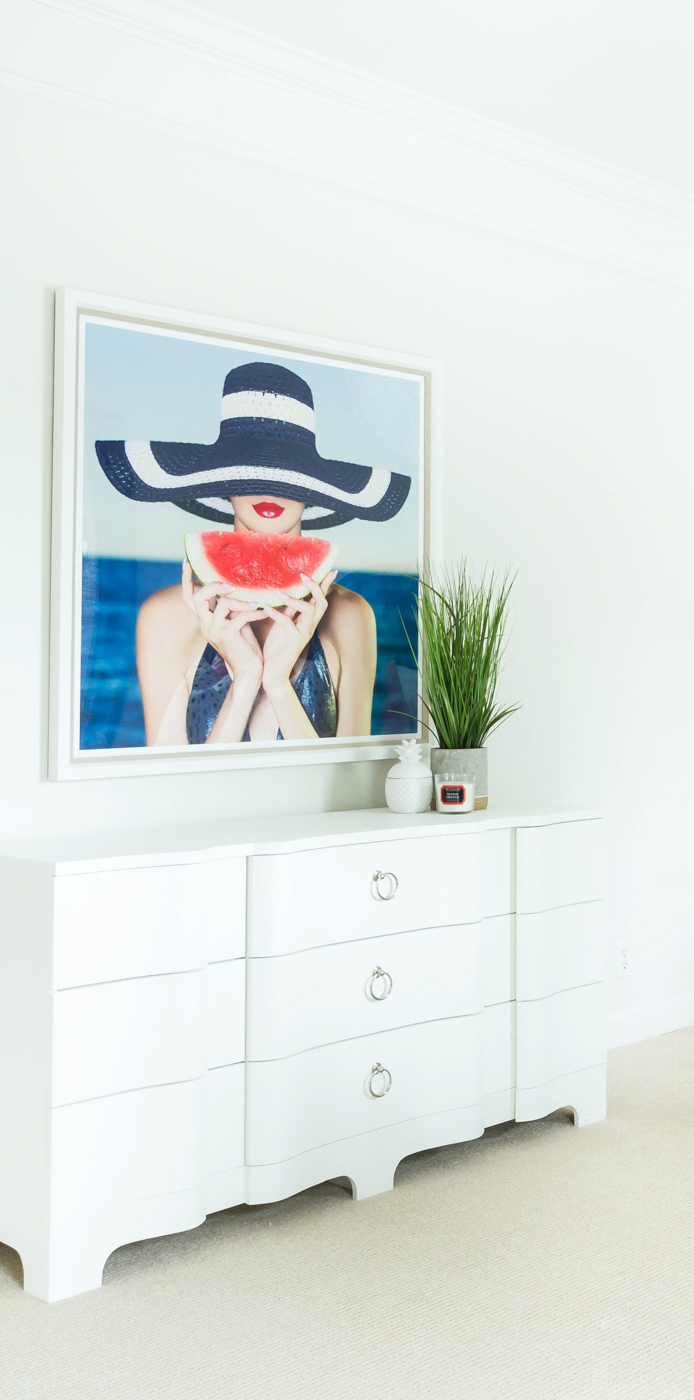 Eclectic Home Tour - love the fun woman with watermelon art in this lake house #art #bedroomdecor 