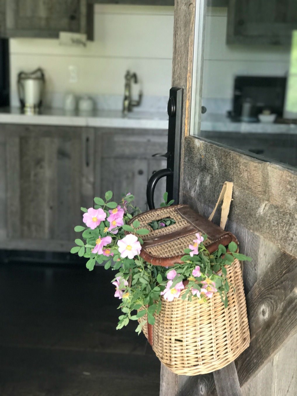 Eclectic Home Tour of Sanctuary Home - welcome to Crow Hollow Ranch. This 500 acre property is complete with farmhouse, guest house and rustic cabin kellyelko.com #hometour #frontdoor #vintage #rusticdecor #barnwood #whitekitchen #homedecor