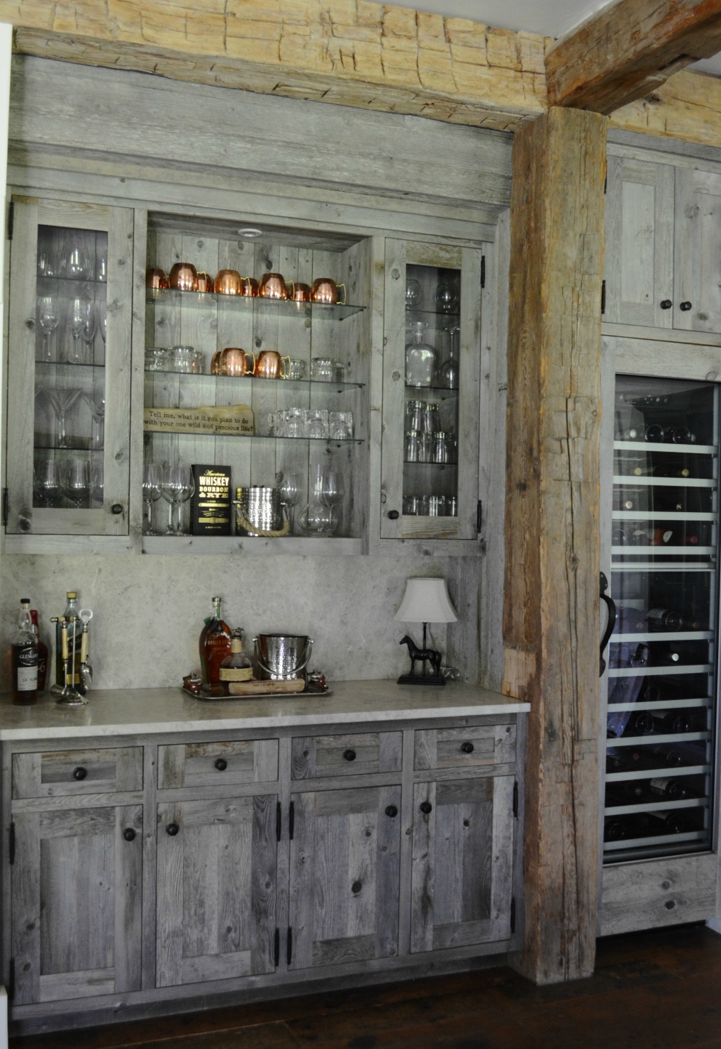 Eclectic Home Tour of Sanctuary Home - welcome to Crow Hollow Ranch. This 500 acre property is complete with farmhouse, guest house and rustic cabin kellyelko.com #hometour #kitchen #rusticdecor #barnwood #whitekitchen #homedecor #bar 