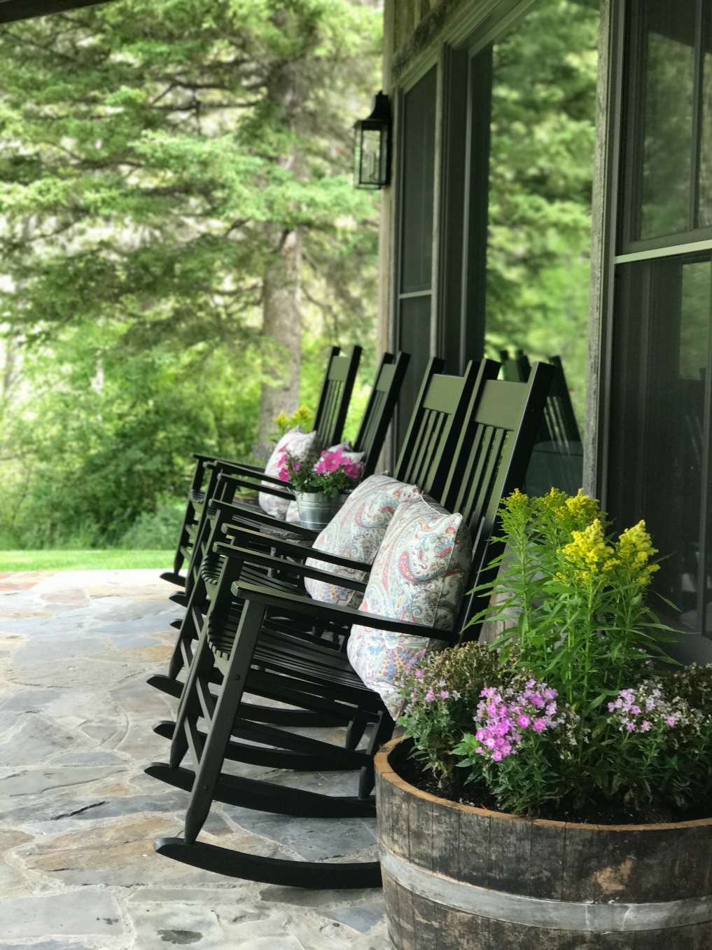 Eclectic Home Tour of Sanctuary Home - welcome to Crow Hollow Ranch. This 500 acre property is complete with farmhouse, guest house and rustic cabin kellyelko.com #hometour #porch #rusticdecor #barnwood #whitekitchen #homedecor