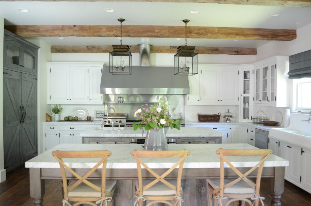 Eclectic Home Tour of Sanctuary Home - welcome to Crow Hollow Ranch. This 500 acre property is complete with farmhouse, guest house and rustic cabin kellyelko.com #ranch #hometour #kitchen #farmhouse #whitekitchen #rusticdecor