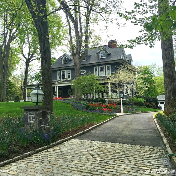 Blue House Exteriors - go bold with exterior paint like this stunning old home kellyelko.com #bluehouses #bluepaint #curbappeal #bluehouse #paintcolors #exteriorpaint #blueexteriors