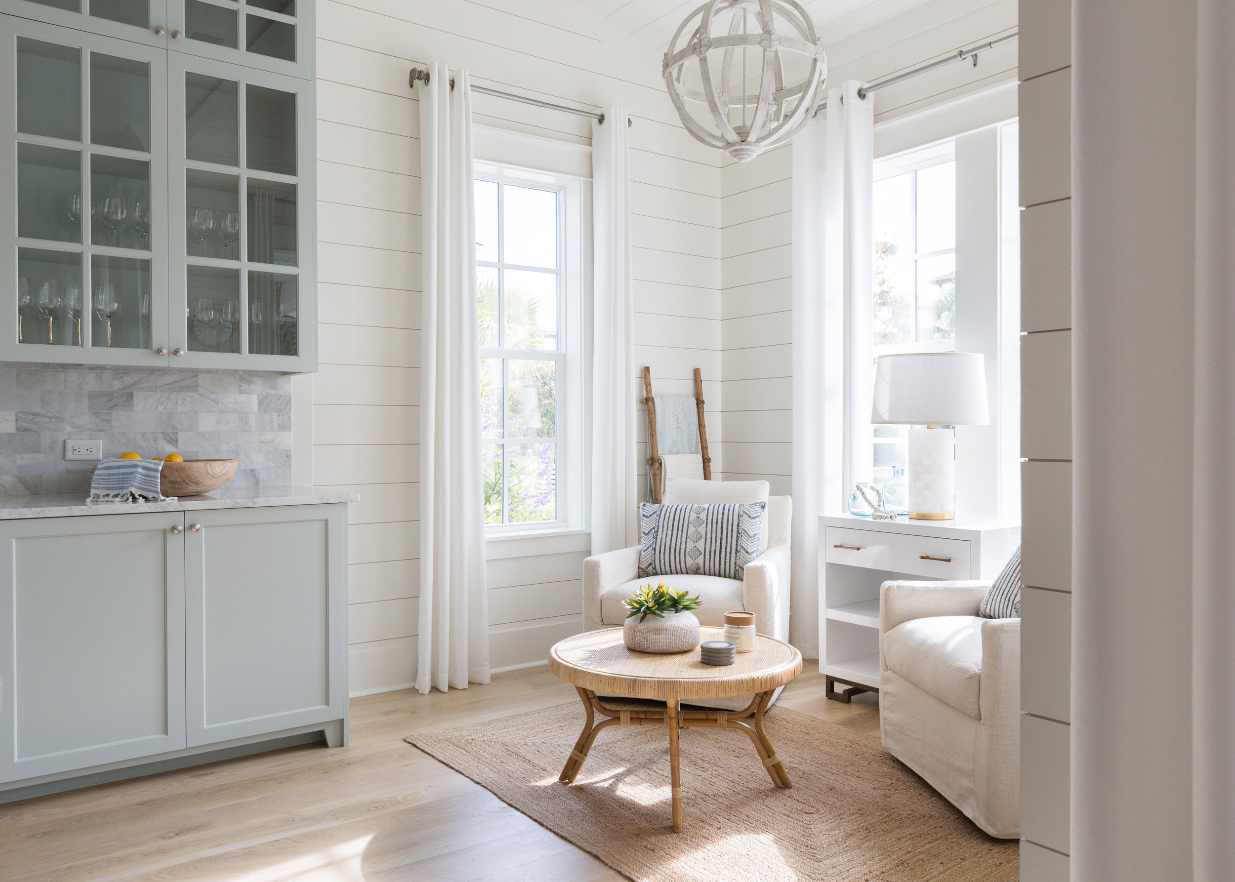 Love this cozy little reading nook open to the kitchen kellyelko.com #kitchens #interiors #decorate #homedecor