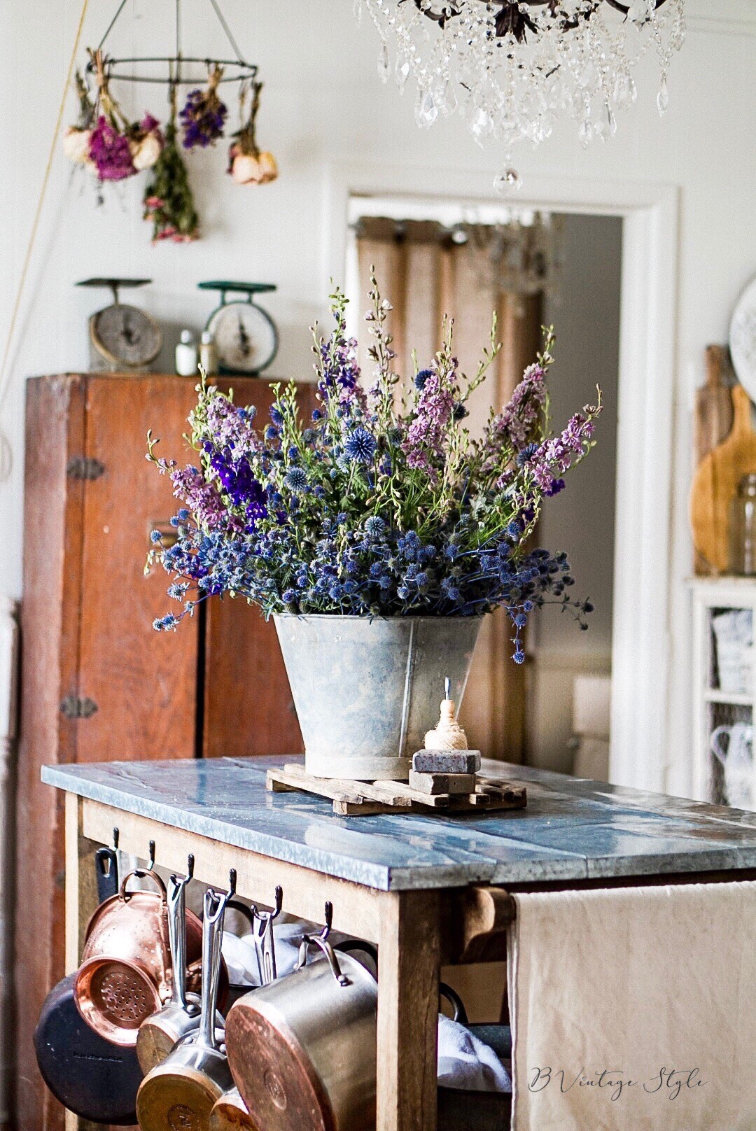 Beautiful old kitchen with wood island kellyelko.com #kitchen #farmhousekitchen #flowers #farmhousestyle #kitchens 
