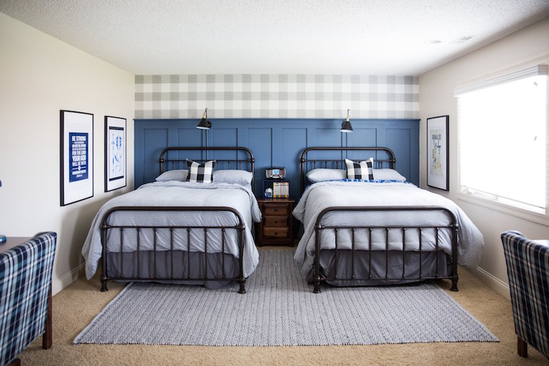 Boys bedroom with two double beds and blue wainscoting kellyelko.com #bedrooms #boysbedrooms #blue