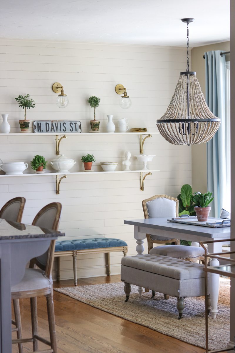 Love this kitchen complete with DIY shiplap walls and open shelving kellyelko.com #kitchenshelves #openshelves #diyideas #kitchen #kitchendecor 