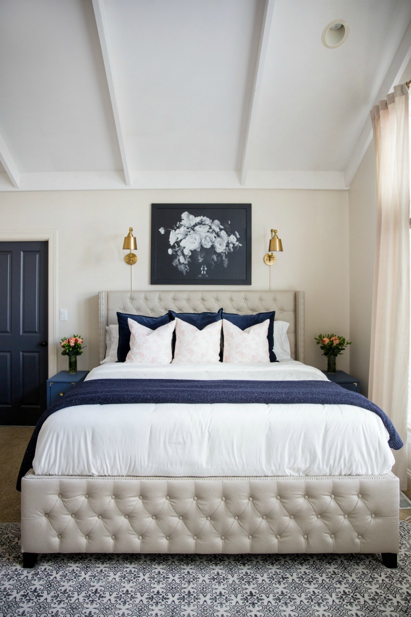 Master bedroom with blue and white accents kellyelko.com #masterbedroom #bedroom #bedroomdecor #lighting #sconces #interiordecor #beds