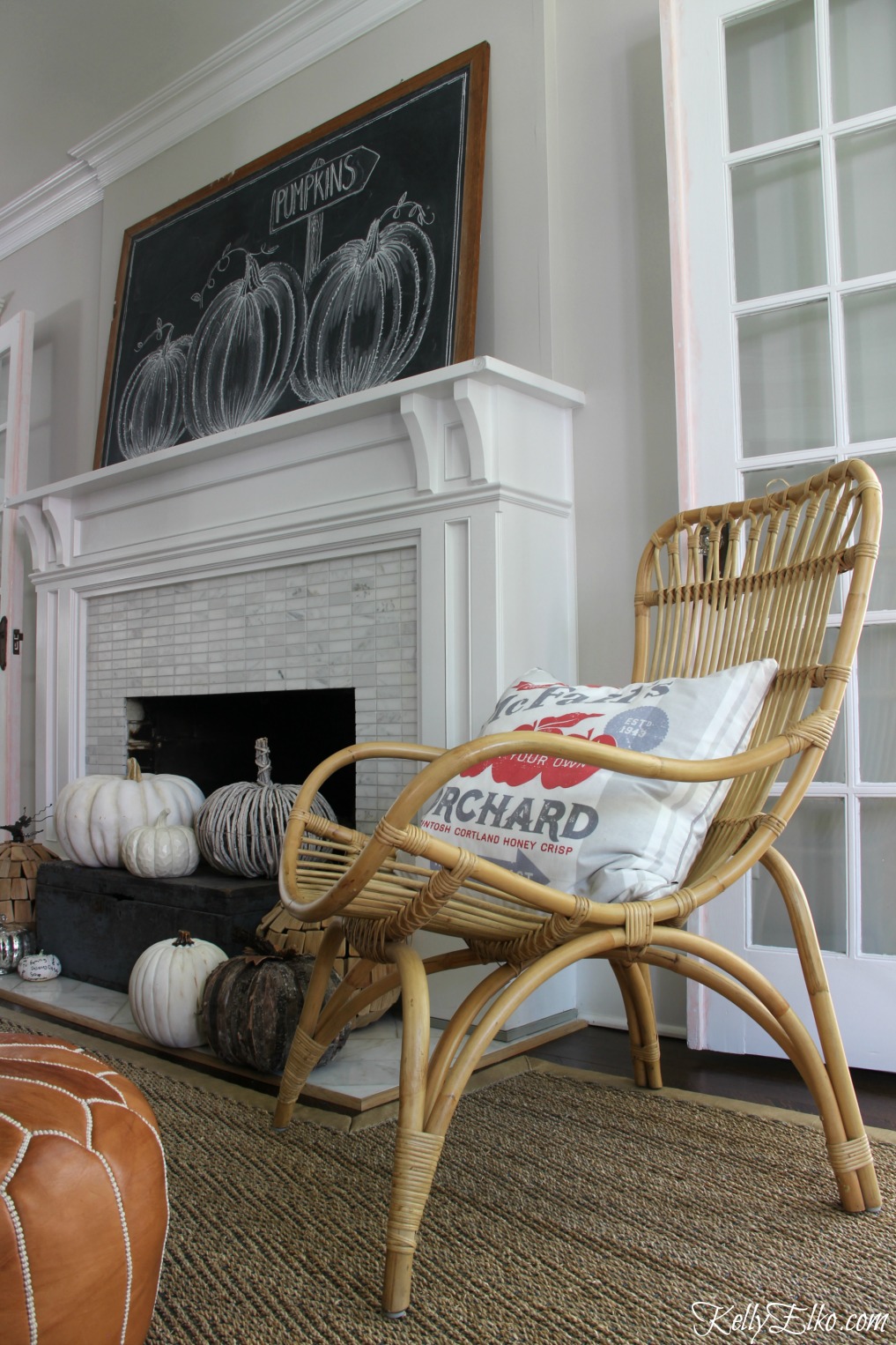 Chalkboard Pumpkin Mantel - love the way she decorated the hearth with an abundance of neutral pumpkins and the chalkboard art is beautiful kellyelko.com #fall #falldecor #fallmantel #chalkboardart #falldecor #pumpkins