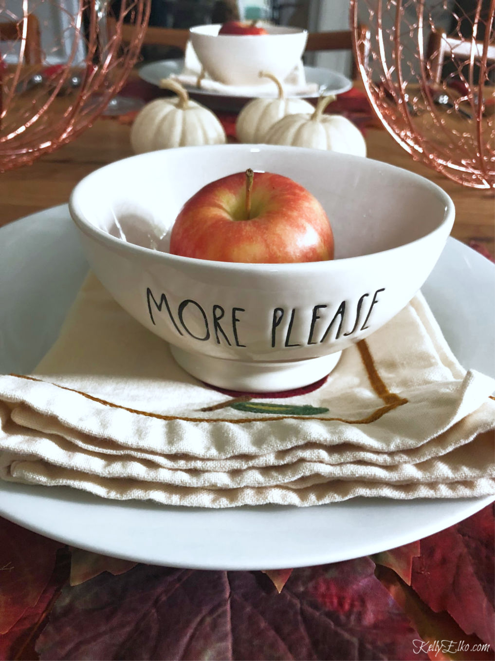 Love these Rae Dunn bowls on a fall tablescape kellyelko.com #fall #falltablescape #raedunn #falldecor #fallleaves #thanksgiving #thanksgivingtable #tablescape #diningroom 