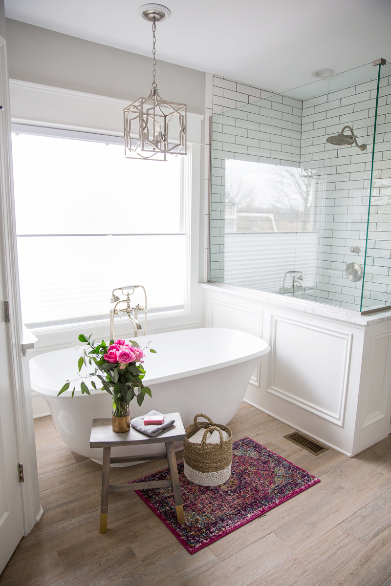 Beautiful bathroom with freestanding tub and subway tile kellyelko.com #bathroom #masterbathroom #bathtub #subwaytile #bathroomrenovation