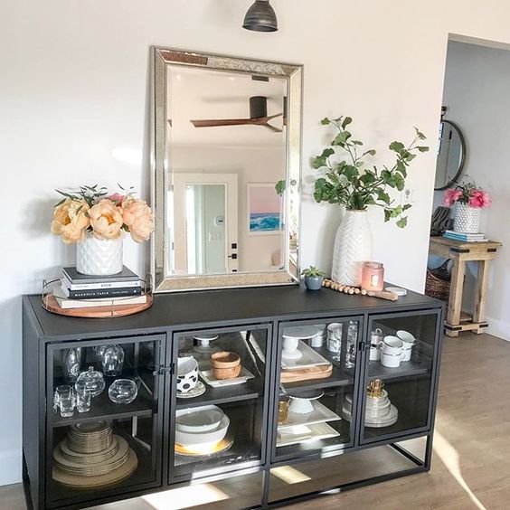 Eclectic Home Tour 1111 Light Lane - love this black metal console in the dining room kellyelko.com #diningroom #diningroomdecor #industrialstyle #eclecticstyle #interiordecor #interiordecorate