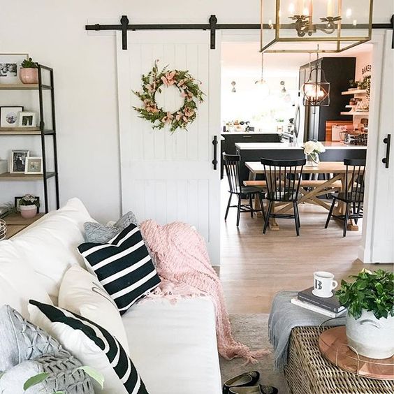 Eclectic Home Tour 1111 Light Lane - love the sliding barn doors in this cottage renovation kellyelko.com #farmhousedecor #cottagedecor #farmhousestyle #cottagestyle #neutraldecor #barndoors #interiodecor 