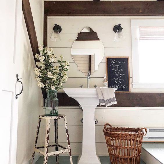 Eclectic Home Tour of The Cobbler Shop on Concord - love this rustic bathroom with shiplap walls and pedestal sink kellyelko.com #farmhouse #farmhousedecor #interiordecor #interiordecorate #bathroom #powderroom #bathroomdecor #shiplap #cottagestyle #hometour #housetour 