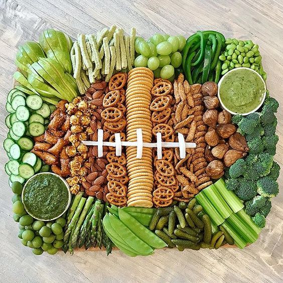 How fun is this football snack tray kellyelko.com #football #gameday #gamedaysnacks #gamedayfood #appetizers #crudite