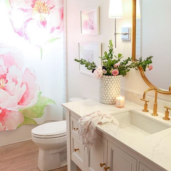 Eclectic Home Tour 1111 Light Lane - love this pink bathroom with floral shower curtain kellyelko.com #bathroom #kidsbathroom #floralbathroom #bathroomdecor #bathroomreno #farmhousedecor #cottagedecor