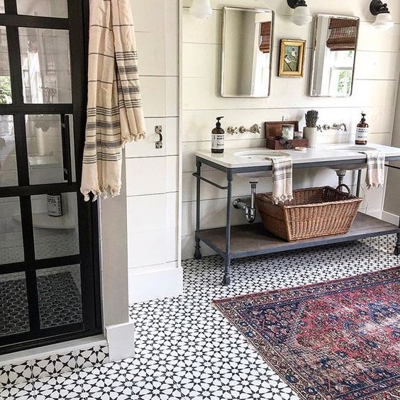 Eclectic Home Tour of The Cobbler Shop on Concord - love the vintage modern bathroom with cement tiles, black shower door and industrial vanity kellyelko.com #farmhouse #farmhousedecor #interiordecor #interiordecorate #bathroom #bathroomdecor #bathroomreno #industrialstyle #vintagemodern #cottagestyle #hometour #housetour 