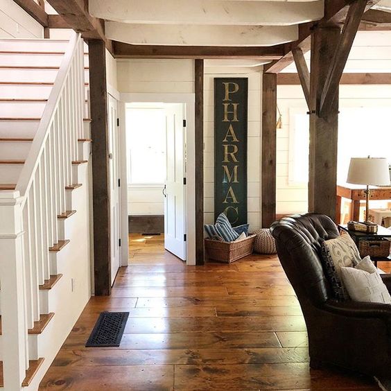 Eclectic Home Tour of The Cobbler Shop on Concord - love the original wood beams and wood floor kellyelko.com #farmhouse #farmhousedecor #interiordecor #interiordecorate #cottagestyle #hometour #housetour #rusticdecor #antiques