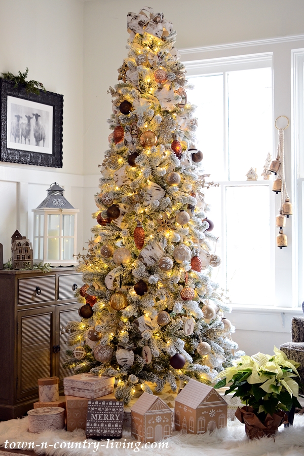 Beautiful Christmas tree and I love the little gingerbread gift boxes under the tree