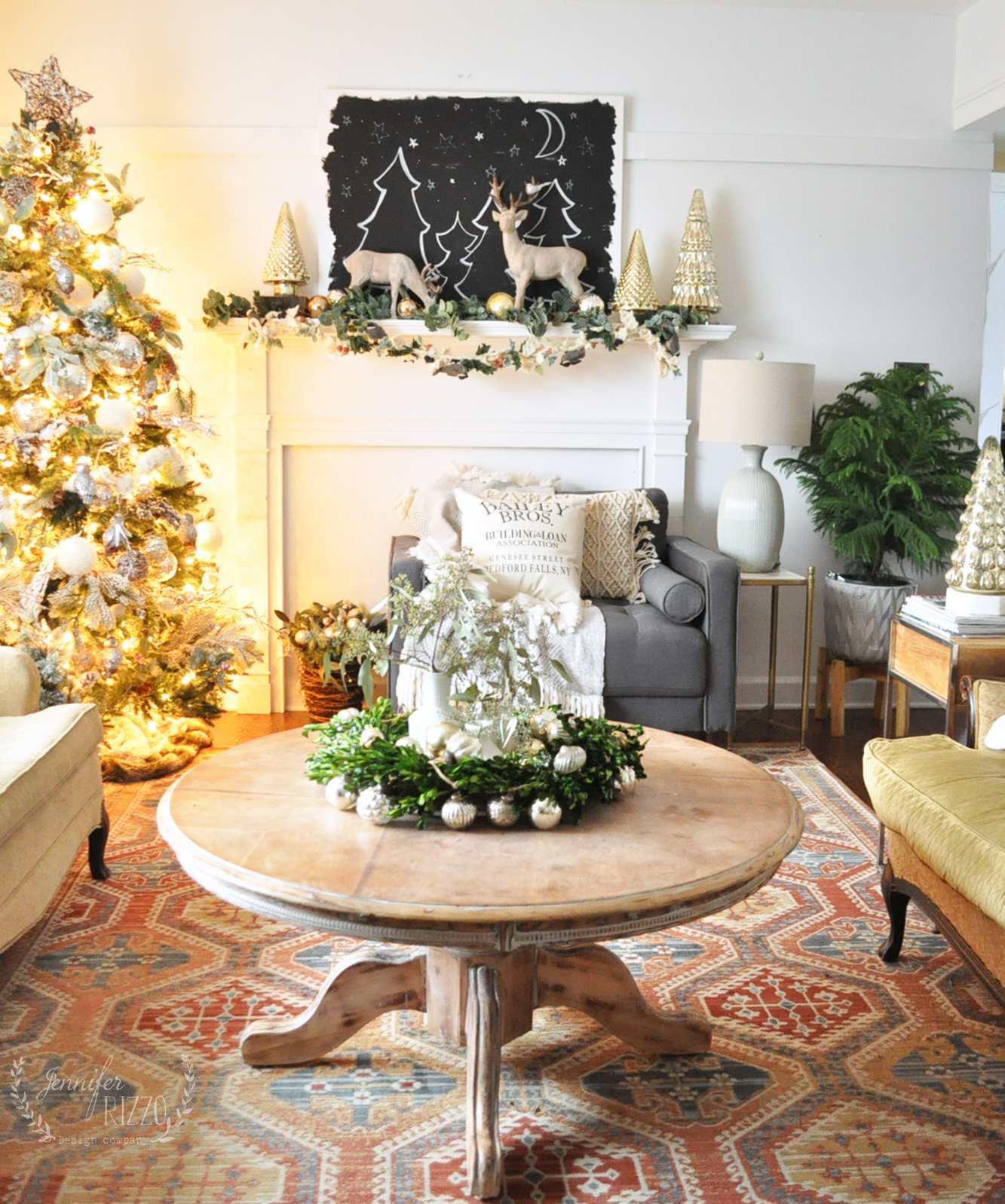 Love this Christmas living room with hand painted black and white starry art on the mantel 