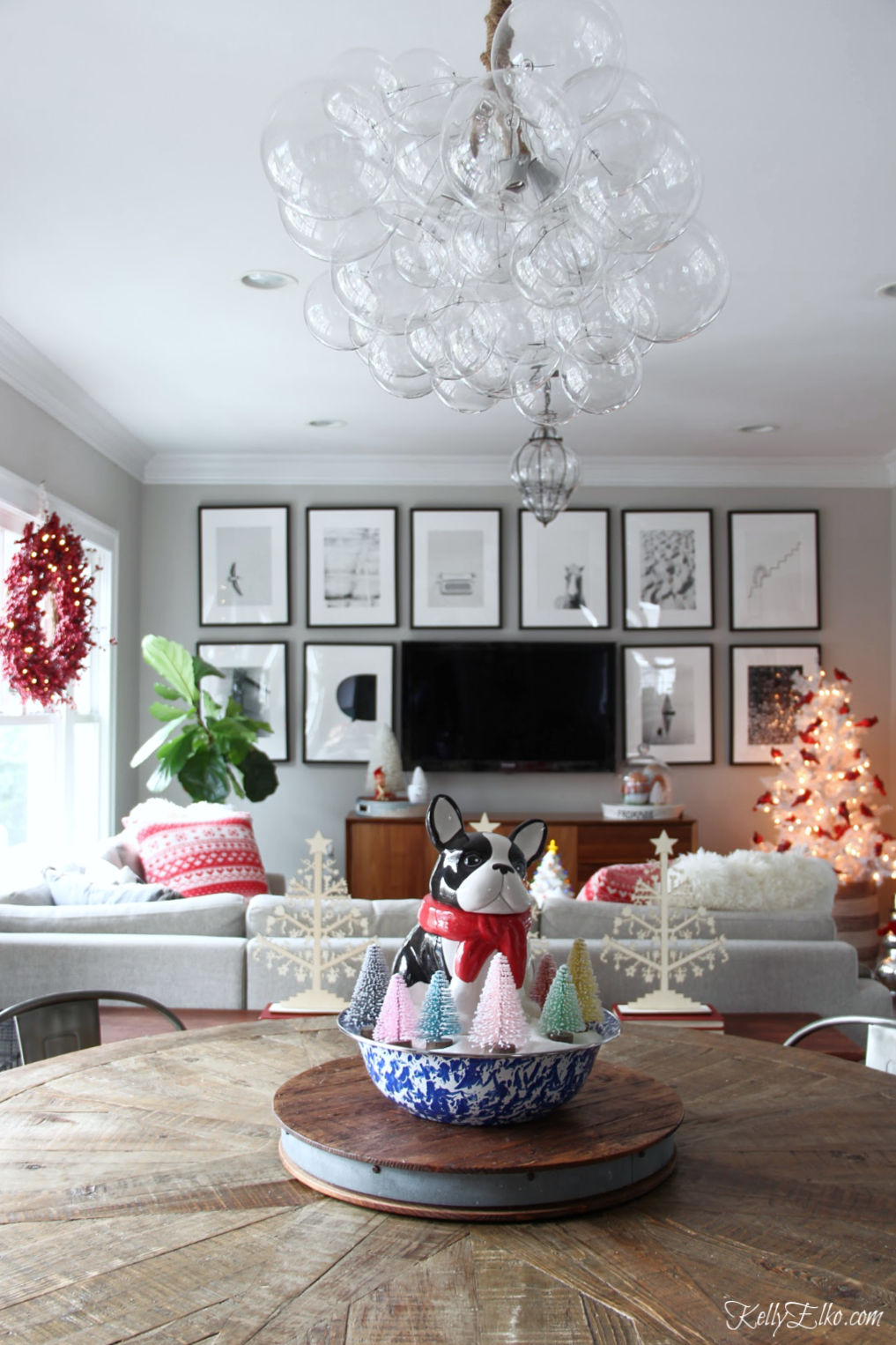 Love this fun Christmas home tour and that beautiful bubble glass chandelier kellyelko.com #lighting #chandelier #christmas #christmascenterpiece #christmasdecor #farmhousechristmas #christmastree