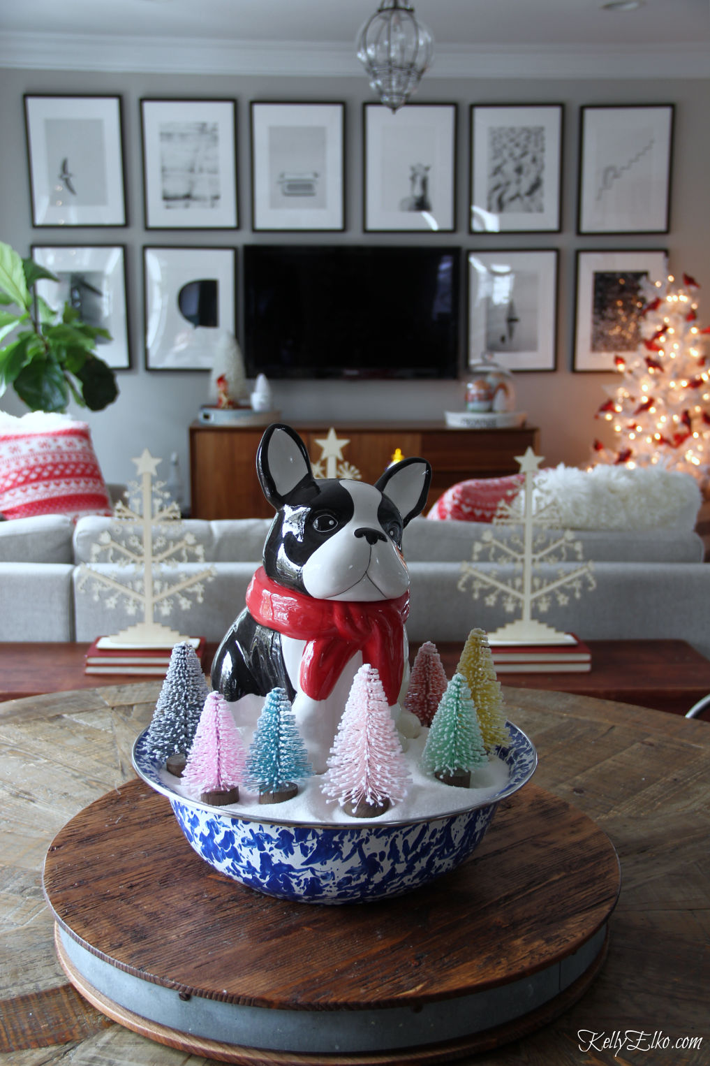 Love this little dog French Bulldog cookie jar surrounded by bottle brush trees for Christmas kellyelko.com #frenchbulldog #christmasdog #christmasdecor #christmascenterpiece #whimsicalchristmas #bottlebrushtrees #vintagechristmas 