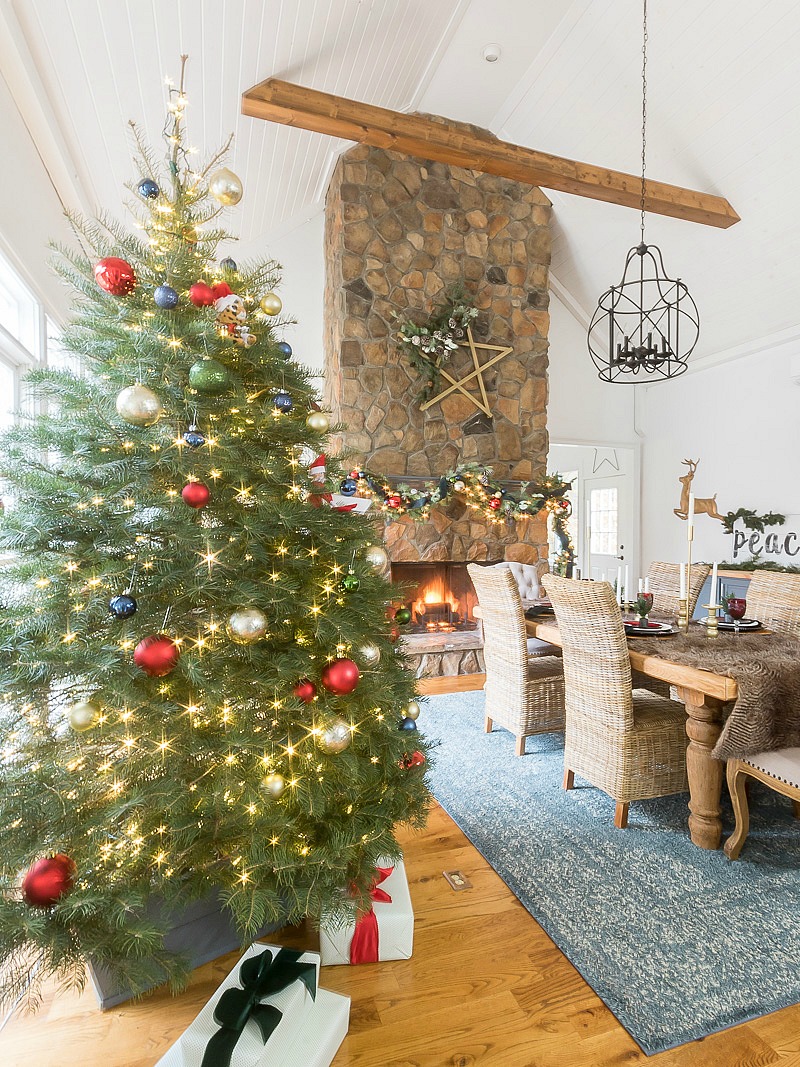 Stunning Christmas dining room with handmade wooden star on mantel