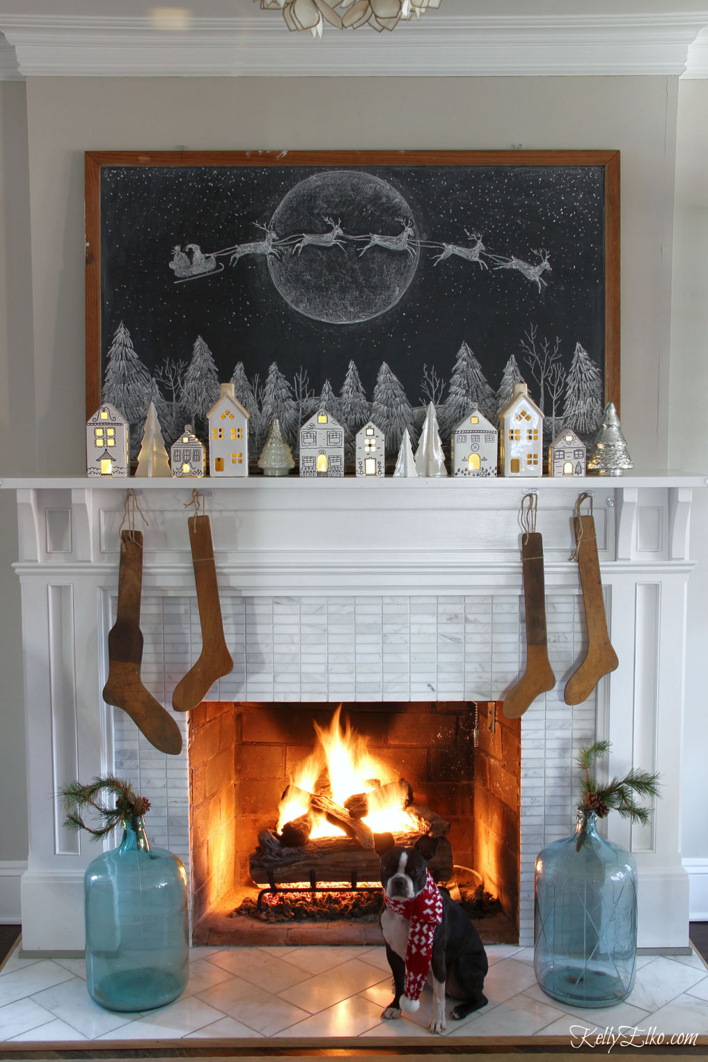 Chalkboard Art - Santa and Reindeer flying over winter village / kellyelko.com