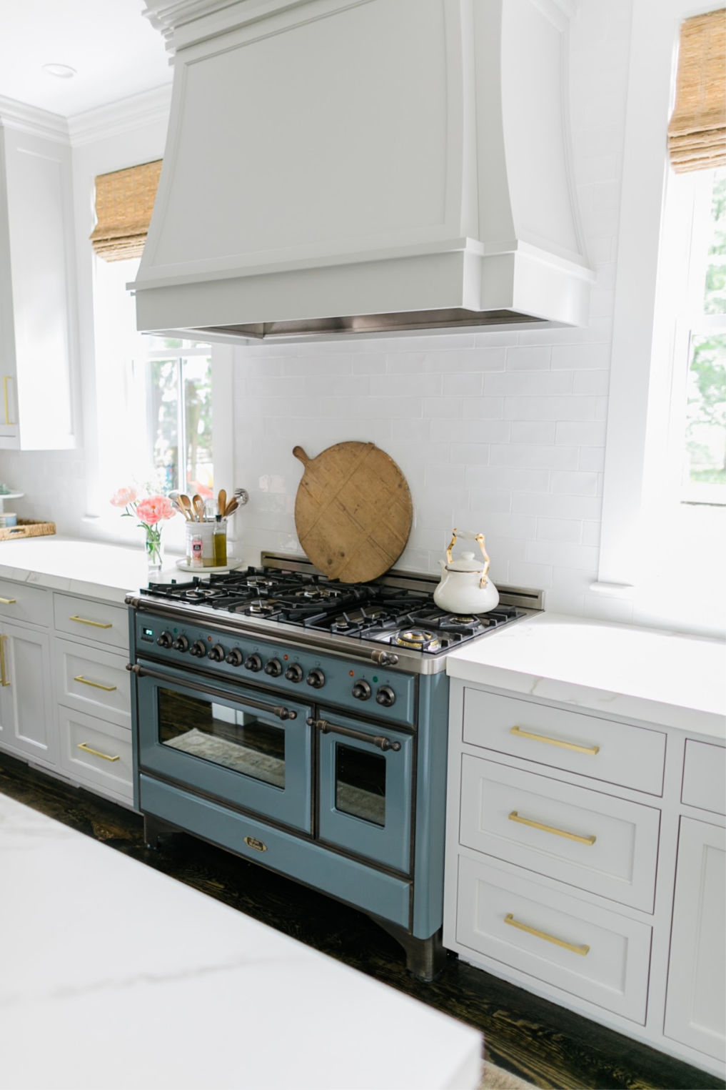 Beautiful white kitchen with Ilve Majestic stove in blue kellyelko.com #kitchen #kitchenoven #vintagekitchen #interiordecorate #interiordesign #kitchenreno #stove