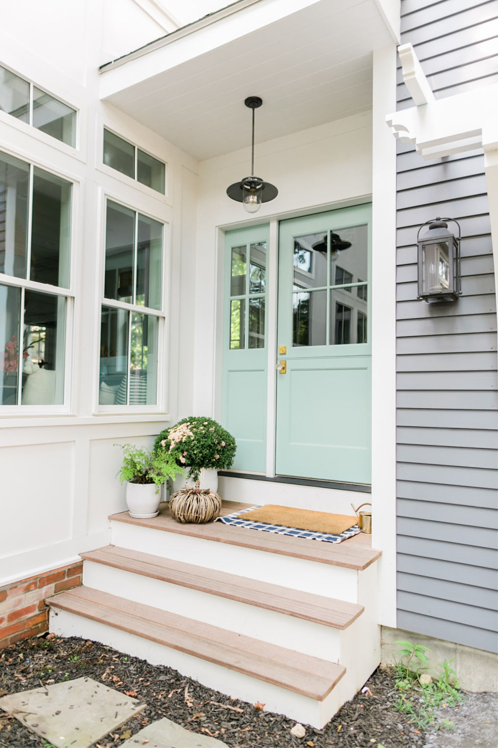 Love this mint green Dutch door kellyelko.com #doors #vintagedoors #porch #porchdecor