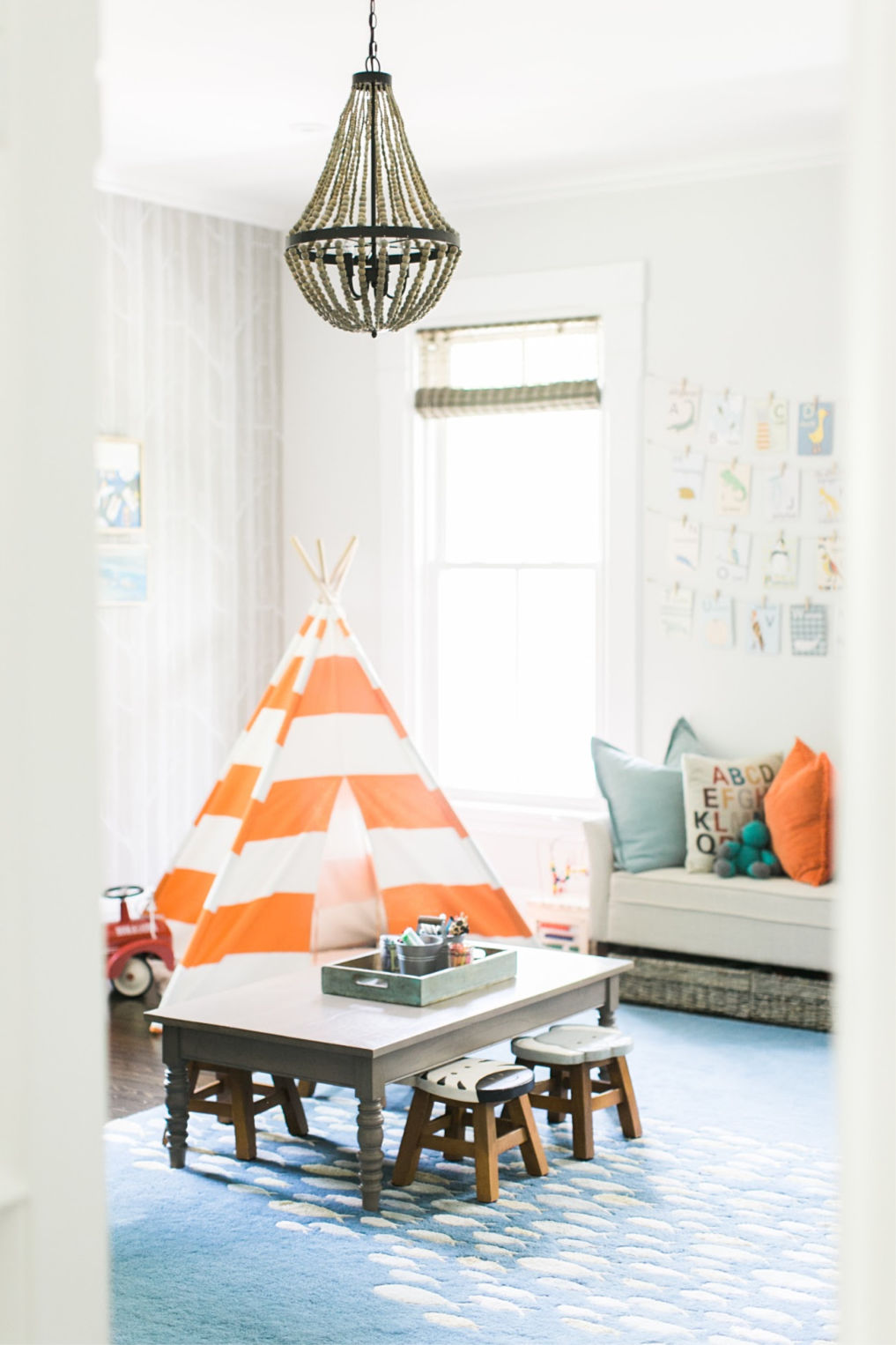 Fun kids playroom with teepee kellyelko.com #playroom #kidsroom #teepee #kidsrooms #kidsbedroom