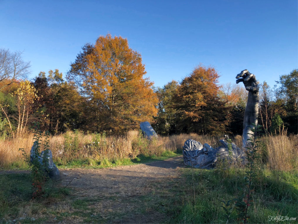 Grounds for Sculpture is a must see for art lovers - The Awakening is a 70 foot giant buried in the ground kellyelko.com #sculpture #art #artlovers #njtravel #travelblog #visitnj 