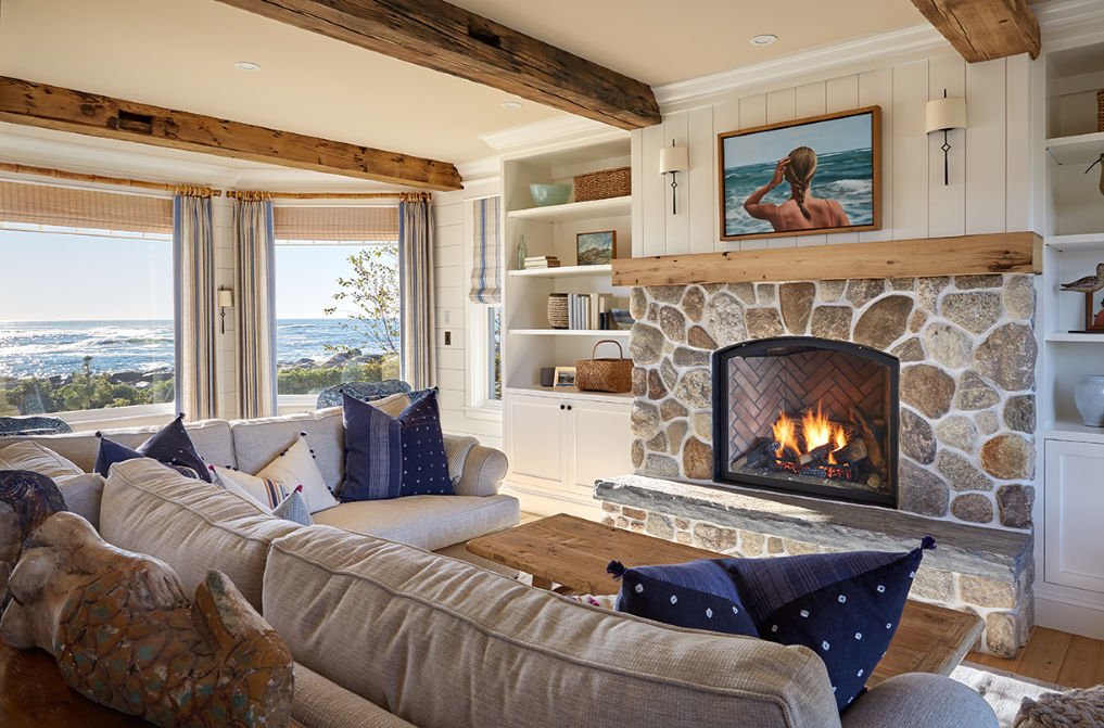 Love this stone fireplace with wood mantel in this beautiful family room kellyelko.com #familyroom #familyroomdecor #livingroom #livingroomdecor #mantel #fireplace #farmhouse #farmhousestyle #interiordecor #interiordecorate #rusticdecor 