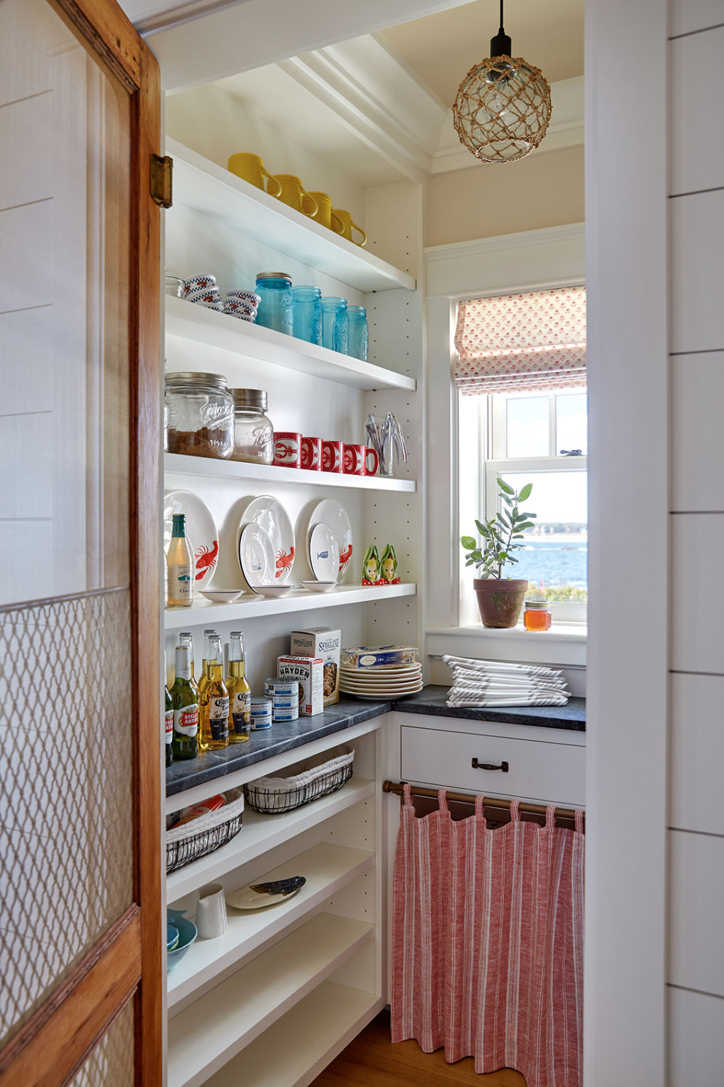 Walk in pantry with a old screen door kellyelko.com #pantry #kitchenpantry #kitchenorganization #organize 